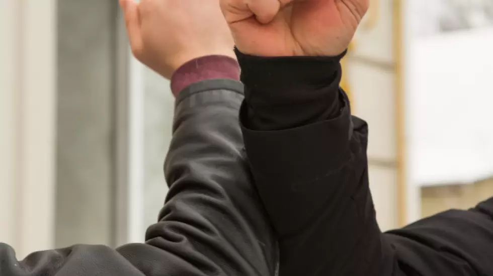 elbow-bump-friends-bumping-elbows-outdoors-people-greeting-together-by-new-style