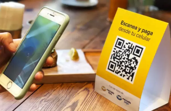 El BCRA busca incentivar el pago con QR en negocios y comercios
