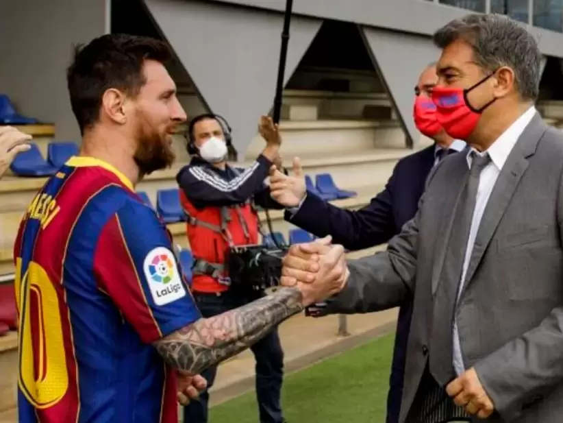 Lionel Messi y Joan Laporta