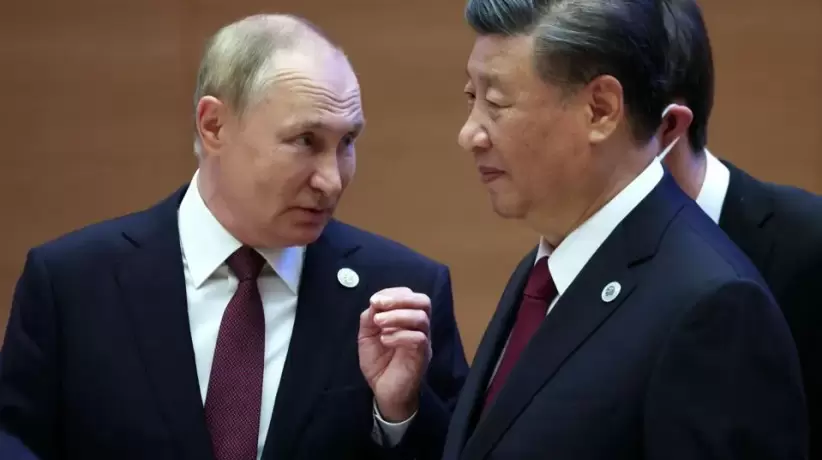 Presidente Vladimir Putin hablanco con el  Presidente Xi Jinping