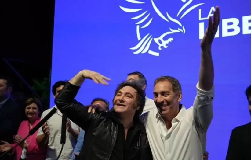 santilli y milei festejan