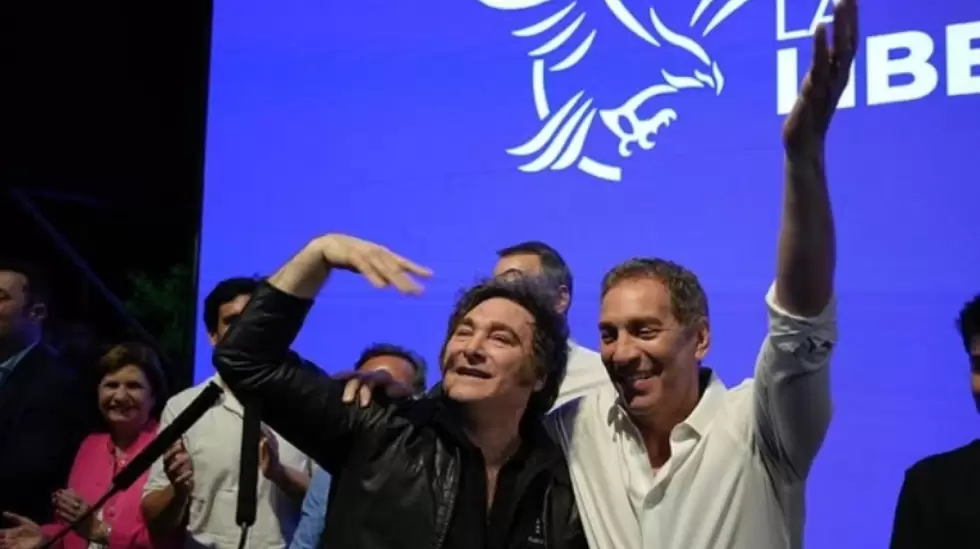 santilli y milei festejan